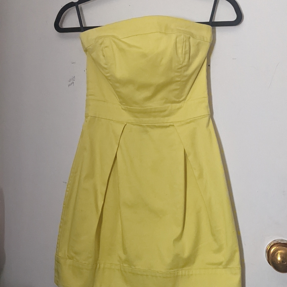 Bright yellow strapless cocktail dress